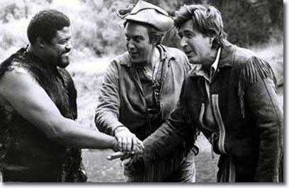 Rosie Grier Jimmy Dean and Fess Parker on the set of the Daniel Boone Show.