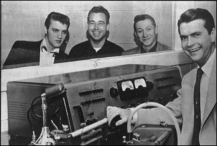 Elvis Presley, Bill Black, Scotty Moore and Sam Phillips at Sun Records, February 3, 1955.