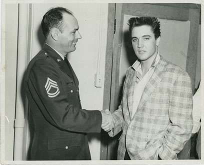 Ginger was five years old when her father met Elvis as a Public Relations Officer in the army in Memphis. This is her dad with Elvis.