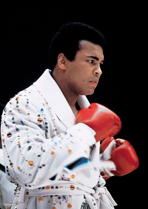 Muhammad Ali wearing the robe and Elvis Presley had given him. vs Ken Norton March 31, 1973.